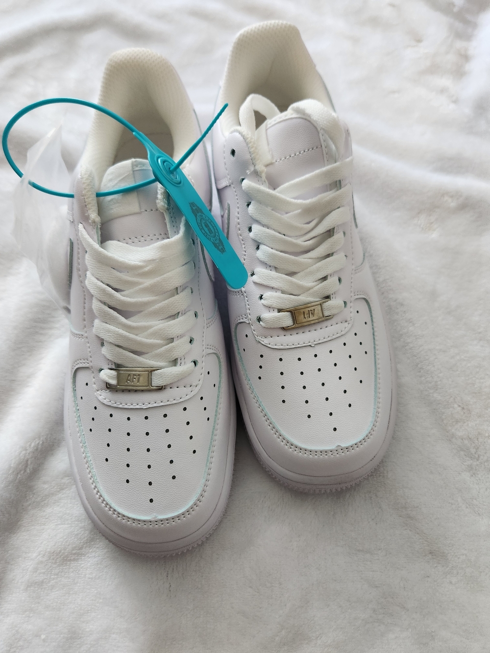 Nike White Low-Top Leather Sneakers with Aqua Tag